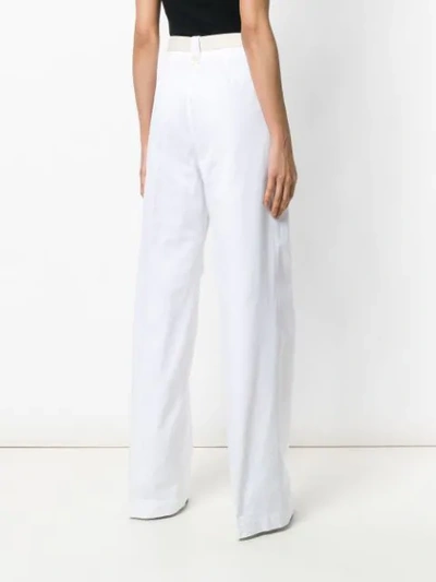 Shop Moncler Belted Wide Leg Trousers In White