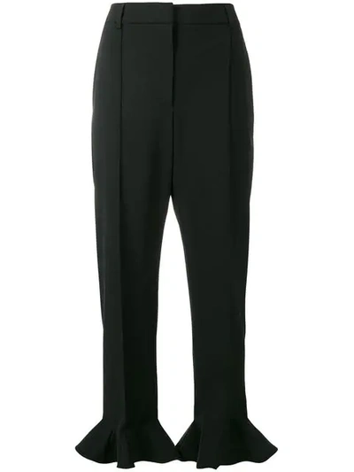 Shop Valentino Ruffled Cuff Trousers In Black