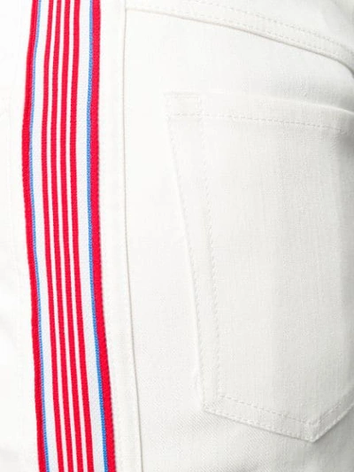 Shop Miu Miu Striped Logo Miniskirt In White