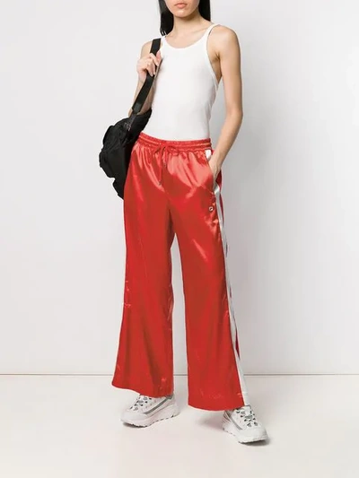 Shop Fila Wide Leg Track Pants In Red