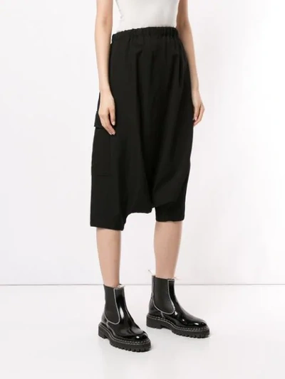 Shop Yohji Yamamoto Drop Crotch Cropped Trousers In Black