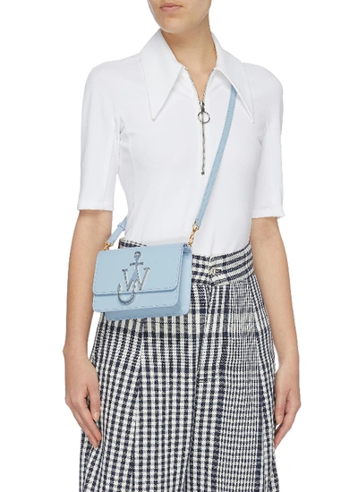 Shop Jw Anderson 'logo' Plate Mini Leather Crossbody Bag In Ice Blue