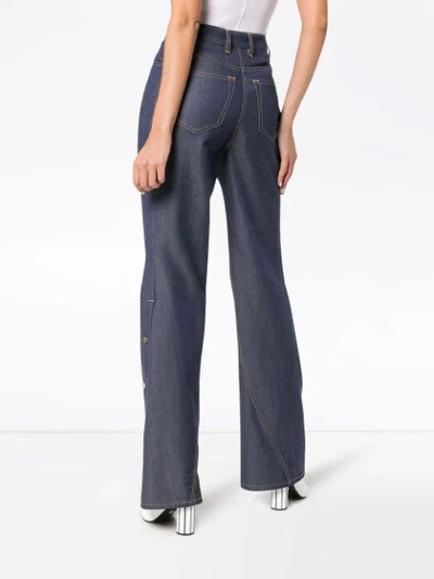 Shop Wright Le Chapelain Button Detail Flared Jeans In Blue