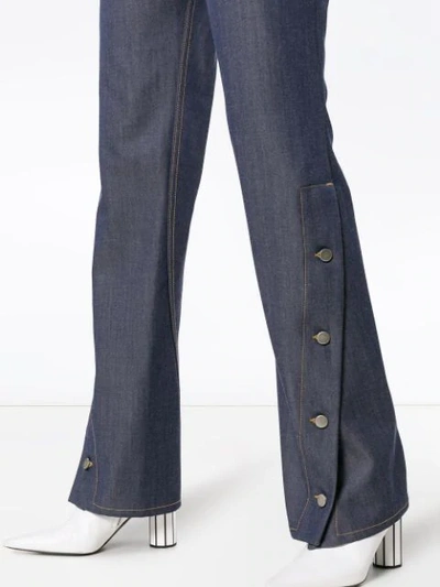 Shop Wright Le Chapelain Button Detail Flared Jeans In Blue