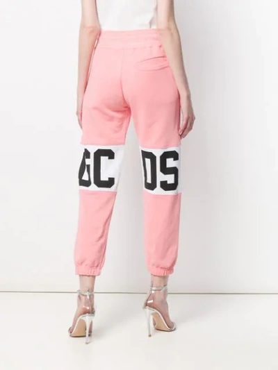 Shop Gcds Cropped Track Pants - Pink