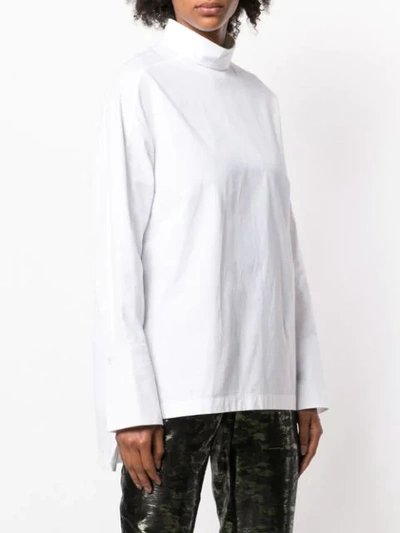 Shop Layeur Mock Neck Blouse In White