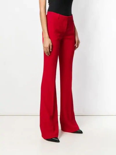 Shop Alexander Mcqueen Bootcut Trousers In Red