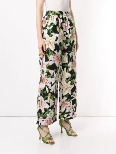 Shop Dolce & Gabbana Lily Print Trousers In Multicolour