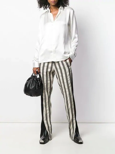 Shop Ann Demeulemeester Striped Trousers - White