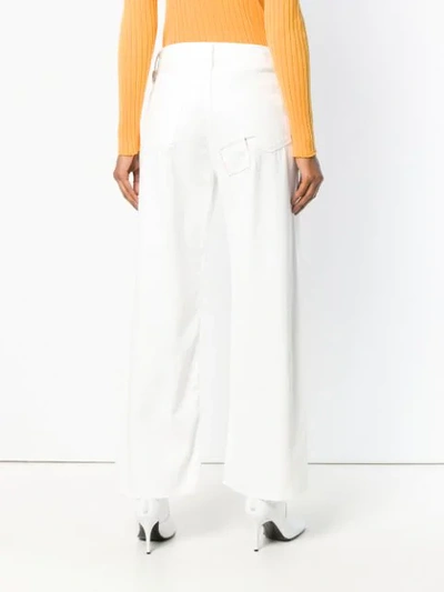 Shop Simon Miller Stitched Wide Leg Jeans In White