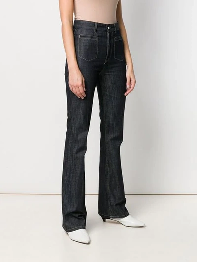 Shop Moncler High-waisted Flared Jeans In Blue