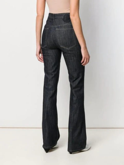 Shop Moncler High-waisted Flared Jeans In Blue