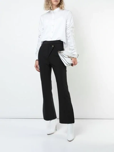 Shop Ellery Wright And Wrong Flared Trousers In Black