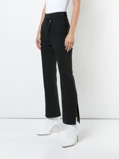 Shop Ellery Wright And Wrong Flared Trousers In Black