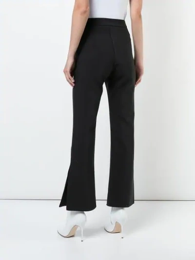 Ellery Wright And Wrong Flared Trousers In Black