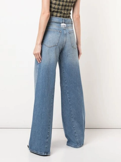 Shop Ganni Bleached Wide Jeans In Blue