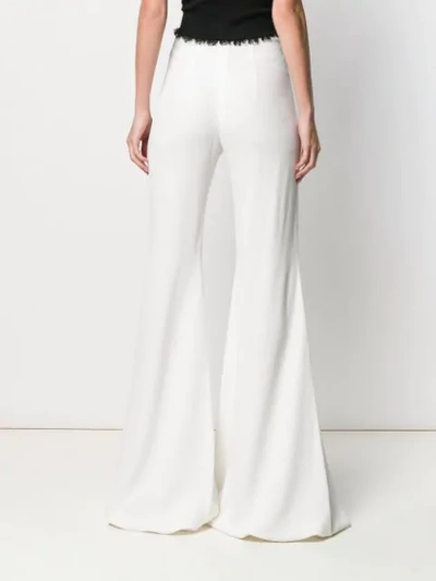 Shop Balmain High Waisted Palazzo Pants In White