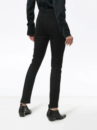 Shop Saint Laurent High-waisted Skinny Jeans In Black