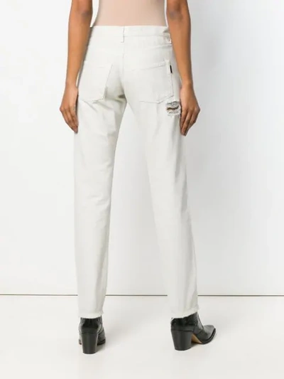Shop Saint Laurent Distressed Boyfriend Jeans In White