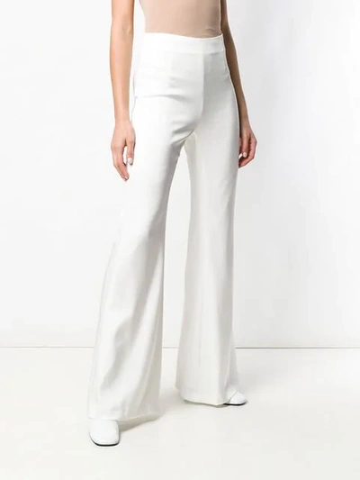 Shop Galvan Flared Trousers In White