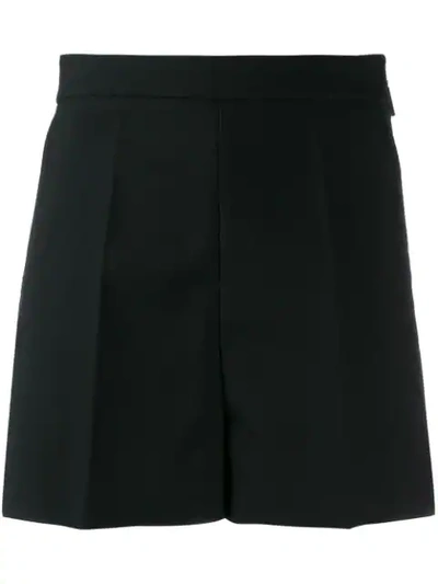 Shop Msgm Creased Shorts In Black