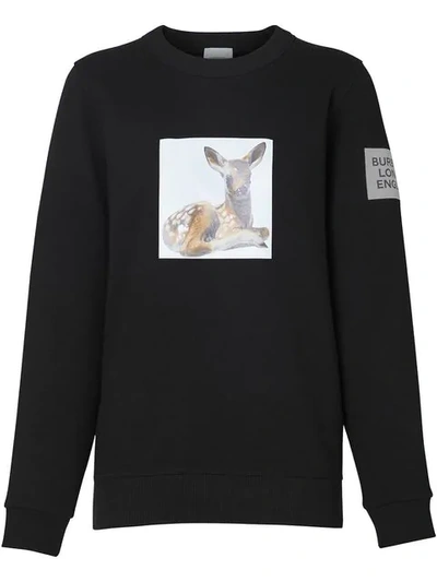 Shop Burberry Deer Print Oversized Sweatshirt In A1189 Black