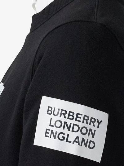 Shop Burberry Deer Print Oversized Sweatshirt In A1189 Black