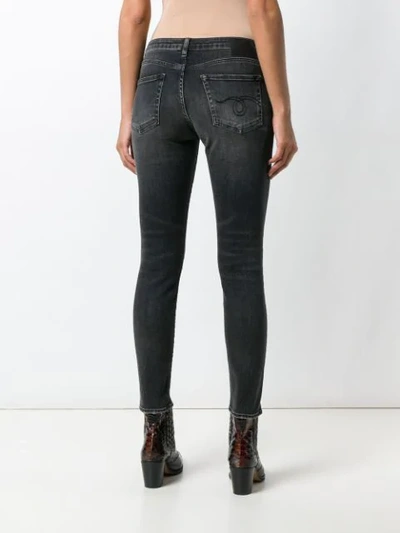 Shop R13 Distressed Skinny Jeans In Black