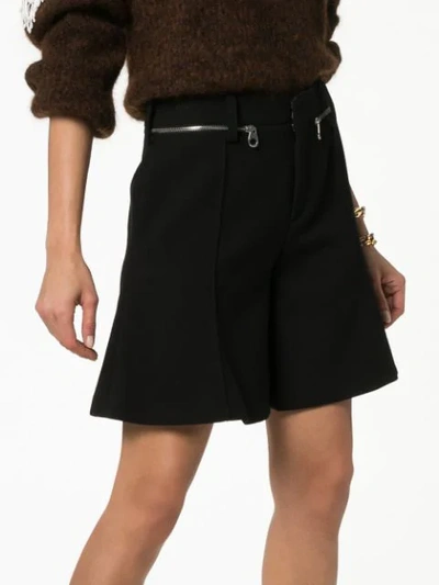 Shop Chloé Flared Shorts - Black