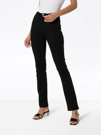 Shop Totême High-waisted Slim-fit Jeans In Black