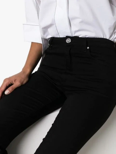 Shop Totême High-waisted Slim-fit Jeans In Black