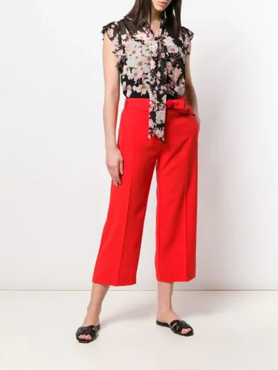 Shop Pinko Tie Waist Cropped Trousers In Red