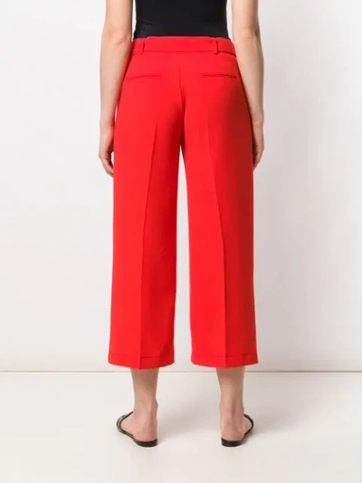 Shop Pinko Tie Waist Cropped Trousers In Red