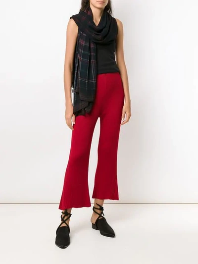 Shop Osklen Flared Trousers In Red