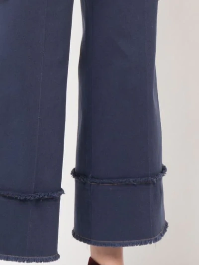 Shop Miu Miu Mid Rise Flared Trousers In Blue