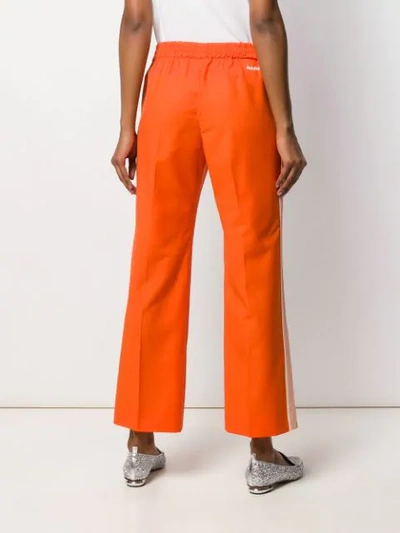 Shop Miu Miu Low Rise Track Trousers - Orange