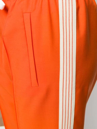 Shop Miu Miu Low Rise Track Trousers - Orange