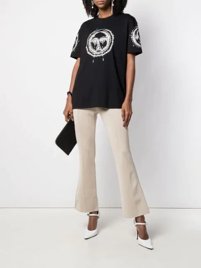 Shop Givenchy Kick Flare Trousers In Neutrals