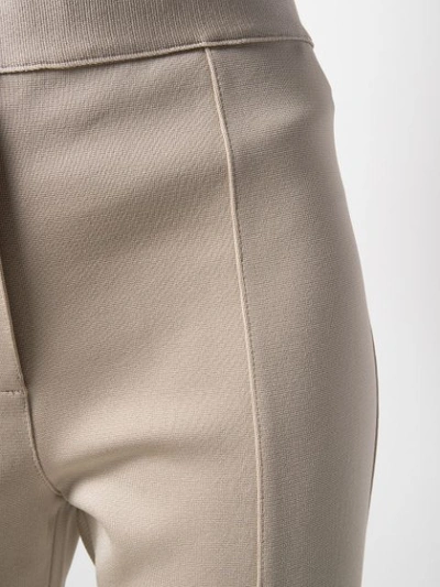 Shop Givenchy Kick Flare Trousers In Neutrals