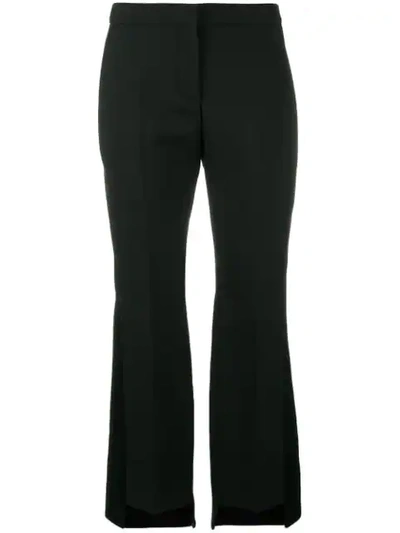 Shop Alexander Mcqueen Step Hem Cropped Trousers In Black