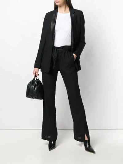 Shop Ann Demeulemeester Belted Tailored Trousers In Black