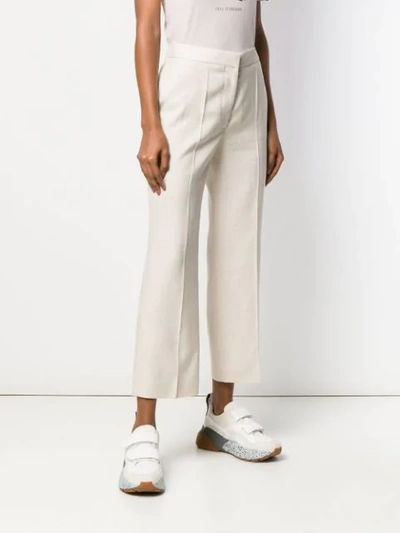 Shop Stella Mccartney Cropped Flared Trousers In Neutrals