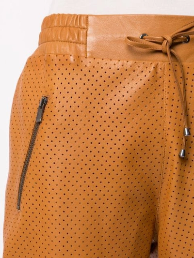 Shop Ecaille Perforated Cropped Trousers In Brown