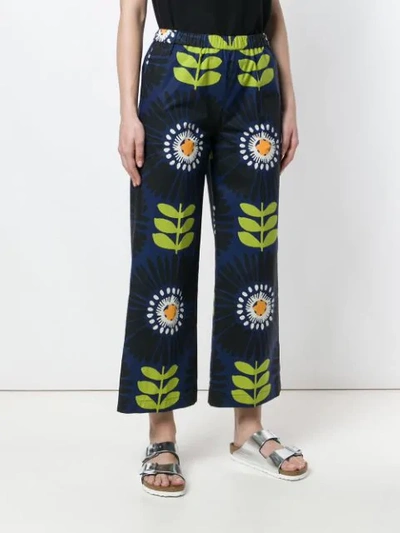 Shop Aspesi Macro Floral Print Trousers In Blue