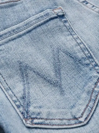 Shop Mother Slit Bootcut Jeans In Blue