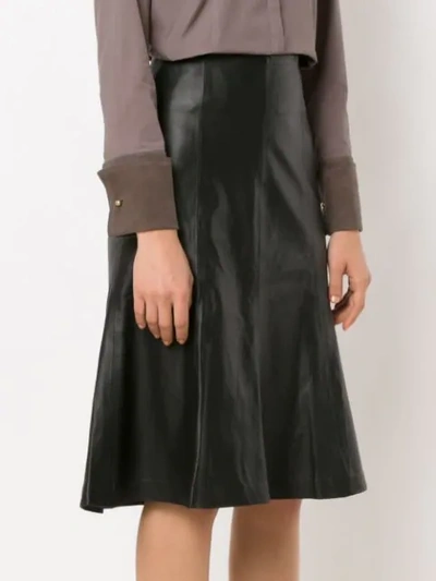 Shop Clé Pleated Midi Skirt In Black