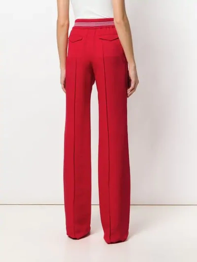 flared fitted trousers