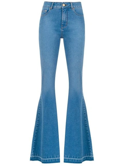 Shop Amapô Denver Flared Jeans In Blue