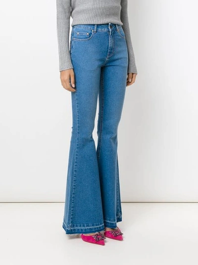 Shop Amapô Denver Flared Jeans In Blue