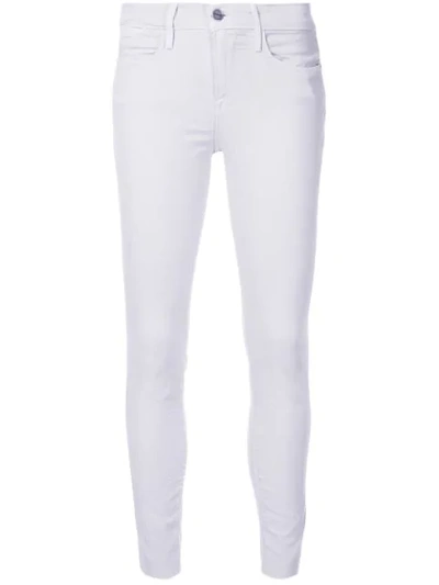 Shop Frame Le High Skinny Raw Edge Jeans In Purple